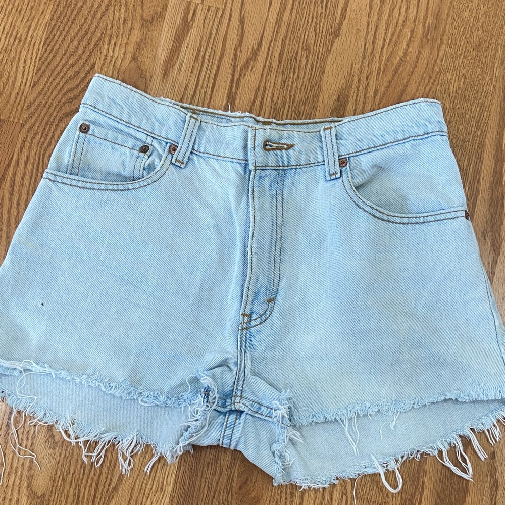 Levi’s ‘90s light Blue Denim Frayed Hem zip up shorts